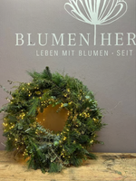 Üppige Winterkränze